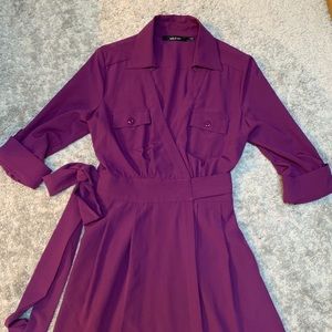 Purple wrap dress.
